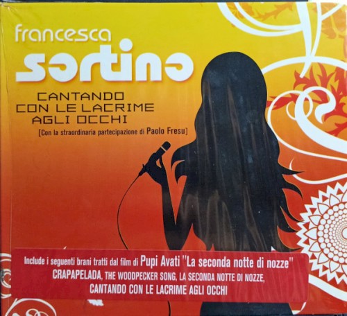 Cantando con le lacrime agli occhi