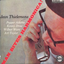 Man Bites Harmonica!